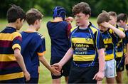24 May 2025; Hugh Lohan of Clara, Offaly, right shakes hands with Skerries, Dublin, players after his side's victory in the X Rugby 7s Boys match between Moate, Westmeath, and Skerries, Dublin, during day one of the Cairn Community Games Multi-Sports Finals 2025 at Gormanston Park in Meath. Photo by Shauna Clinton/Sportsfile