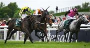 24 May 2025; James's Delight, left, with Oisin Murphy up, on their way to winning the Weatherbys Ireland Greenlands Stakes during day two of the Tattersalls Irish Guineas Festival at The Curragh Racecourse in Kildare. Photo by Seb Daly/Sportsfile