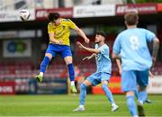 24 May 2025; Oleg Vysochan of Fairview Rangers in action against Ciaran Paige of North End United during the FAI Junior Cup final match between Fairview Rangers and North End United at Turner's Cross in Cork. Photo by Tom Beary/Sportsfile