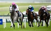 24 May 2025; Field Of Gold, left, with Colin Keane up, on their way to winning the Tattersalls Irish 2,000 Guineas during day two of the Tattersalls Irish Guineas Festival at The Curragh Racecourse in Kildare. Photo by Seb Daly/Sportsfile
