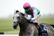 24 May 2025; Field Of Gold, with Colin Keane up, cross the line to win the Tattersalls Irish 2,000 Guineas during day two of the Tattersalls Irish Guineas Festival at The Curragh Racecourse in Kildare. Photo by Seb Daly/Sportsfile