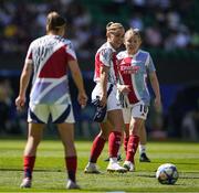 24 May 2025; Katie McCabe of Arsenal and her teammate warm up before the UEFA Women's Champions League final match between Arsenal and Barcelona at Estádio José Alvalade in Lisbon, Portugal. Photo by Pedro Loureiro/Sportsfile