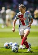 24 May 2025; Katie McCabe of Arsenal warms up before the UEFA Women's Champions League final match between Arsenal and Barcelona at Estádio José Alvalade in Lisbon, Portugal. Photo by Pedro Loureiro/Sportsfile