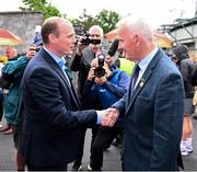 24 May 2025; DUP MLA for East Antrim and Minister for Communities Gordon Lyons, left, is welcomed by Michael Geoghegan President of the Ulster Council GAA before the GAA Football All-Ireland Senior Championship Round 1 match between Armagh and Derry at the BOX-IT Athletic Grounds in Armagh. Photo by Ray McManus/Sportsfile
