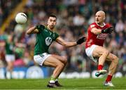 24 May 2025; Donal Keogan of Meath in action against Matty Taylor of Cork during the GAA Football All-Ireland Senior Championship Round 1 match between Meath and Cork at Páirc Tailteann in Navan, Meath. Photo by Thomas Flinkow/Sportsfile