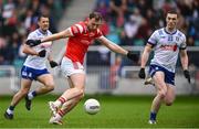 24 May 2025; Sam Mulroy of Louth shoots to score his side's first goal, as Killian Lavelle of Monaghan closes in, during the GAA Football All-Ireland Senior Championship Round 1 match between Louth and Monaghan at Cedral St Conleth's in Newbridge, Kildare. Photo by Piaras Ó Mídheach/Sportsfile