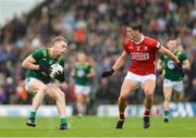 24 May 2025; Mathew Costello of Meath in action against Colm O'Callaghan of Cork during the GAA Football All-Ireland Senior Championship Round 1 match between Meath and Cork at Páirc Tailteann in Navan, Meath. Photo by Thomas Flinkow/Sportsfile
