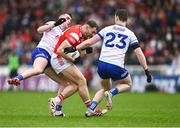 24 May 2025; Sam Mulroy of Louth in action against Mícheál McCarville, left, and Killian Lavelle of Monaghan during the GAA Football All-Ireland Senior Championship Round 1 match between Louth and Monaghan at Cedral St Conleth's in Newbridge, Kildare. Photo by Piaras Ó Mídheach/Sportsfile
