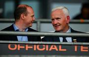 24 May 2025; DUP MLA for East Antrim and Minister for Communities Gordon Lyons, left, and Michael Geoghegan President of the Ulster Council GAA take up therir seats in the third minute of the GAA Football All-Ireland Senior Championship Round 1 match between Armagh and Derry at the BOX-IT Athletic Grounds in Armagh. Photo by Ray McManus/Sportsfile