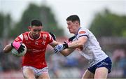 24 May 2025; Ciarán Downey of Louth in action against Dylan Byrne of Monaghan during the GAA Football All-Ireland Senior Championship Round 1 match between Louth and Monaghan at Cedral St Conleth's in Newbridge, Kildare. Photo by Piaras Ó Mídheach/Sportsfile