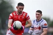 24 May 2025; Ciarán Downey of Louth in action against Dylan Byrne of Monaghan during the GAA Football All-Ireland Senior Championship Round 1 match between Louth and Monaghan at Cedral St Conleth's in Newbridge, Kildare. Photo by Piaras Ó Mídheach/Sportsfile