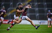 24 May 2025; Cian Hannon of Galway on his way to scoring his side's first goal despite the efforts of Josh Dowling of Kilkenny during the Electric Ireland Leinster GAA Hurling Minor Championship final match between Kilkenny and Galway at Laois Hire O'Moore Park in Portlaoise, Laois. Photo by Tyler Miller/Sportsfile