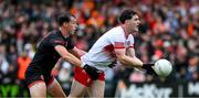 24 May 2025; Padraig McGrogan of Derry in action against Barry McCambridge of Armagh during the GAA Football All-Ireland Senior Championship Round 1 match between Armagh and Derry at the BOX-IT Athletic Grounds in Armagh. Photo by Ray McManus/Sportsfile