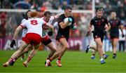 24 May 2025; Darragh McMullan of Armagh in action against Brendan Rogers and Conor Glass of Derry, 8, during the GAA Football All-Ireland Senior Championship Round 1 match between Armagh and Derry at the BOX-IT Athletic Grounds in Armagh. Photo by Ray McManus/Sportsfile