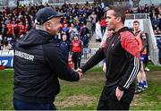 24 May 2025; Monaghan manager Gabriel Bannigan and Louth manager Ger Brennan shake hands after the GAA Football All-Ireland Senior Championship Round 1 match between Louth and Monaghan at Cedral St Conleth's in Newbridge, Kildare. Photo by Piaras Ó Mídheach/Sportsfile