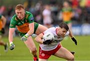 24 May 2025; Cormac Quinn of Tyrone in action against Oisin Gallen of Donegal during the GAA Football All-Ireland Senior Championship Round 1 match between Donegal and Tyrone at MacCumhaill Park in Ballybofey, Donegal. Photo by Ramsey Cardy/Sportsfile