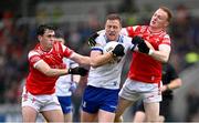 24 May 2025; Kieran Duffy of Monaghan in action against Kieran McArdle, left, and Donal McKenny of Louth during the GAA Football All-Ireland Senior Championship Round 1 match between Louth and Monaghan at Cedral St Conleth's in Newbridge, Kildare. Photo by Piaras Ó Mídheach/Sportsfile