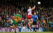 24 May 2025; Conn Kilpatrick of Tyrone wins possession ahead of Michael Murphy of Donegal during the GAA Football All-Ireland Senior Championship Round 1 match between Donegal and Tyrone at MacCumhaill Park in Ballybofey, Donegal. Photo by Ramsey Cardy/Sportsfile