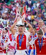 24 May 2025; Katie McCabe of Arsenal celebrates with the UEFA Women's Champions League trophy after the Champions League final match between Arsenal and Barcelona at Estádio José Alvalade in Lisbon, Portugal. Photo by Daniela Porcelli /Sportsfile