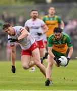 24 May 2025; Ryan McHugh of Donegal in action against Brian Kennedy of Tyrone during the GAA Football All-Ireland Senior Championship Round 1 match between Donegal and Tyrone at MacCumhaill Park in Ballybofey, Donegal. Photo by Ramsey Cardy/Sportsfile