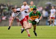 24 May 2025; Ryan McHugh of Donegal in action against Brian Kennedy of Tyrone during the GAA Football All-Ireland Senior Championship Round 1 match between Donegal and Tyrone at MacCumhaill Park in Ballybofey, Donegal. Photo by Ramsey Cardy/Sportsfile