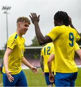 24 May 2025; Josh McCarthy, left, of Fairview Rangers, celebrates after scoring his side's third goal with teammate Gbadebo Habideen during the FAI Junior Cup final match between Fairview Rangers and North End United at Turner's Cross in Cork. Photo by Tom Beary/Sportsfile