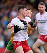24 May 2025; Ciaran Daly of Tyrone in action against Eoin McHugh of Donegal during the GAA Football All-Ireland Senior Championship Round 1 match between Donegal and Tyrone at MacCumhaill Park in Ballybofey, Donegal. Photo by Ramsey Cardy/Sportsfile