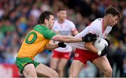 24 May 2025; Ciaran Daly of Tyrone in action against Eoghan Bán Gallagher of Donegal during the GAA Football All-Ireland Senior Championship Round 1 match between Donegal and Tyrone at MacCumhaill Park in Ballybofey, Donegal. Photo by Ramsey Cardy/Sportsfile