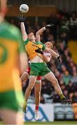 24 May 2025; Hugh McFadden of Donegal in action against Conn Kilpatrick of Tyrone during the GAA Football All-Ireland Senior Championship Round 1 match between Donegal and Tyrone at MacCumhaill Park in Ballybofey, Donegal. Photo by Ramsey Cardy/Sportsfile