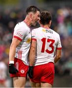 24 May 2025; Ciaran Daly, left, and Darren McCurry of Tyrone react at the final whistle of the GAA Football All-Ireland Senior Championship Round 1 match between Donegal and Tyrone at MacCumhaill Park in Ballybofey, Donegal. Photo by Ramsey Cardy/Sportsfile