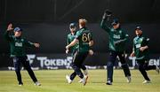 25 May 2025; Ireland bowler Barry McCarthy, 60, celebrates with teammates after taking the wicket of Brandon King of West Indies, trapped lbw, during match three of the One Day International Series between Ireland and the West Indies at Castle Avenue Cricket Ground in Dublin. Photo by Seb Daly/Sportsfile