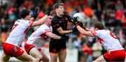 24 May 2025; Andrew Murnin of Armagh in action against Padraig McGrogan, left, Diarmuid Baker and Brendan Rogers of Derry , right, during the GAA Football All-Ireland Senior Championship Round 1 match between Armagh and Derry at the BOX-IT Athletic Grounds in Armagh. Photo by Ray McManus/Sportsfile