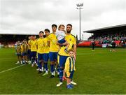 24 May 2025; Fairview Rangers players stand for the playing of the Amhrán na bhFiann before the FAI Junior Cup final match between Fairview Rangers and North End United at Turner's Cross in Cork. Photo by Tom Beary/Sportsfile