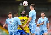 24 May 2025; Craig McCabe of North End United in action against Gbadebo Habideen of Fairview Rangers during the FAI Junior Cup final match between Fairview Rangers and North End United at Turner's Cross in Cork. Photo by Tom Beary/Sportsfile