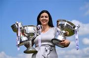 27 May 2025; At the launch of the 2025 TG4 All-Ireland Ladies Football Championships is Máire Ní Bhraonáin of TG4, with the West County Hotel cup, the Brendan Martin cup and the Mary Quinn Memorial cup. The 2025 TG4 All-Ireland Championships were launched at Croke Park today, after a number of top inter-county stars travelled to Athlone in Westmeath to mark the beginning of the TG4 All-Ireland series. The 2025 TG4 All-Ireland Junior, Intermediate and Senior Finals will be played at Croke Park on Sunday, August 3, 2025. #ProperFan. Photo by Brendan Moran/Sportsfile