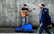 25 May 2025; A busker perfroms outside of the stadium as supporters arrive before the Leinster GAA Hurling Senior Championship Round 5 match between Dublin and Galway at Parnell Park in Dublin. Photo by Tyler Miller/Sportsfile