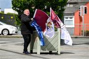25 May 2025; A flag seller prepares his stall before the Leinster GAA Hurling Senior Championship Round 5 match between Dublin and Galway at Parnell Park in Dublin. Photo by Ray McManus/Sportsfile