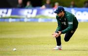 25 May 2025; Barry McCarthy of Ireland attempts to field the ball during match three of the One Day International Series between Ireland and the West Indies at Castle Avenue Cricket Ground in Dublin. Photo by Seb Daly/Sportsfile