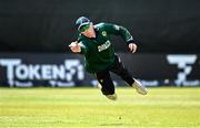25 May 2025; Harry Tector of Ireland fields the ball during match three of the One Day International Series between Ireland and the West Indies at Castle Avenue Cricket Ground in Dublin. Photo by Seb Daly/Sportsfile