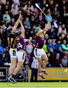 25 May 2025; Wexford players Kevin Foley, right, and Mikie Dwyer in action against Padraic Moylan of Kilkenny during the Leinster GAA Hurling Senior Championship Round 5 match between Wexford and Kilkenny at Chadwicks Wexford Park in Wexford. Photo by Thomas Flinkow/Sportsfile