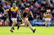 25 May 2025; Adrian Mullen of Kilkenny in action against Kevin Foley of Wexford during the Leinster GAA Hurling Senior Championship Round 5 match between Wexford and Kilkenny at Chadwicks Wexford Park in Wexford. Photo by Thomas Flinkow/Sportsfile