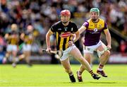 25 May 2025; Adrian Mullen of Kilkenny in action against Kevin Foley of Wexford during the Leinster GAA Hurling Senior Championship Round 5 match between Wexford and Kilkenny at Chadwicks Wexford Park in Wexford. Photo by Thomas Flinkow/Sportsfile
