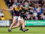 25 May 2025; Mikie Dwyer of Wexford loses his hurley in action against Kilkenny goalkeeper Eoin Murphy during the Leinster GAA Hurling Senior Championship Round 5 match between Wexford and Kilkenny at Chadwicks Wexford Park in Wexford. Photo by Thomas Flinkow/Sportsfile