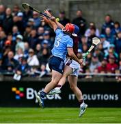 25 May 2025; Paddy Smyth of Dublin and Anthony Burns of Galway contest a high ball during the Leinster GAA Hurling Senior Championship Round 5 match between Dublin and Galway at Parnell Park in Dublin. Photo by Tyler Miller/Sportsfile