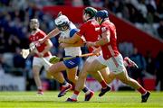 25 May 2025; Stephen Bennett of Waterford is tackled by Cork players Mark Coleman, left, and Seán O’Donoghue during the Munster GAA Hurling Senior Championship Round 5 match between Cork and Waterford at SuperValu Páirc Ui Chaoimh in Cork. Photo by Brendan Moran/Sportsfile