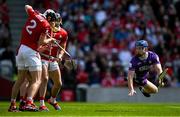 25 May 2025; Ger Millerick of Cork, left, stops a shot on goal from Stephen Bennett of Waterford, not pictured, as Cork goalkeeper Patrick Collins looks on during the Munster GAA Hurling Senior Championship Round 5 match between Cork and Waterford at SuperValu Páirc Ui Chaoimh in Cork. Photo by Brendan Moran/Sportsfile