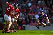 25 May 2025; Ger Millerick of Cork, left, stops a shot on goal from Stephen Bennett of Waterford, not pictured, as Cork goalkeeper Patrick Collins looks on during the Munster GAA Hurling Senior Championship Round 5 match between Cork and Waterford at SuperValu Páirc Ui Chaoimh in Cork. Photo by Brendan Moran/Sportsfile