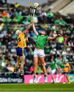 25 May 2025; Ryan Taylor of Clare in action against Gearóid Hegarty of Limerick during the Munster GAA Hurling Senior Championship Round 5 match between Limerick and Clare at TUS Gaelic Grounds in Limerick. Photo by Tom Beary/Sportsfile