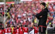 25 May 2025; Injured Cork hurler Robert Downey watches the warm-up beforethe Munster GAA Hurling Senior Championship Round 5 match between Cork and Waterford at SuperValu Páirc Ui Chaoimh in Cork. Photo by Piaras Ó Mídheach/Sportsfile