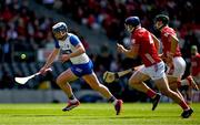 25 May 2025; Stephen Bennett of Waterford races clear of Cork players Seán O’Donoghue, left, and Mark Coleman during the Munster GAA Hurling Senior Championship Round 5 match between Cork and Waterford at SuperValu Páirc Ui Chaoimh in Cork. Photo by Brendan Moran/Sportsfile